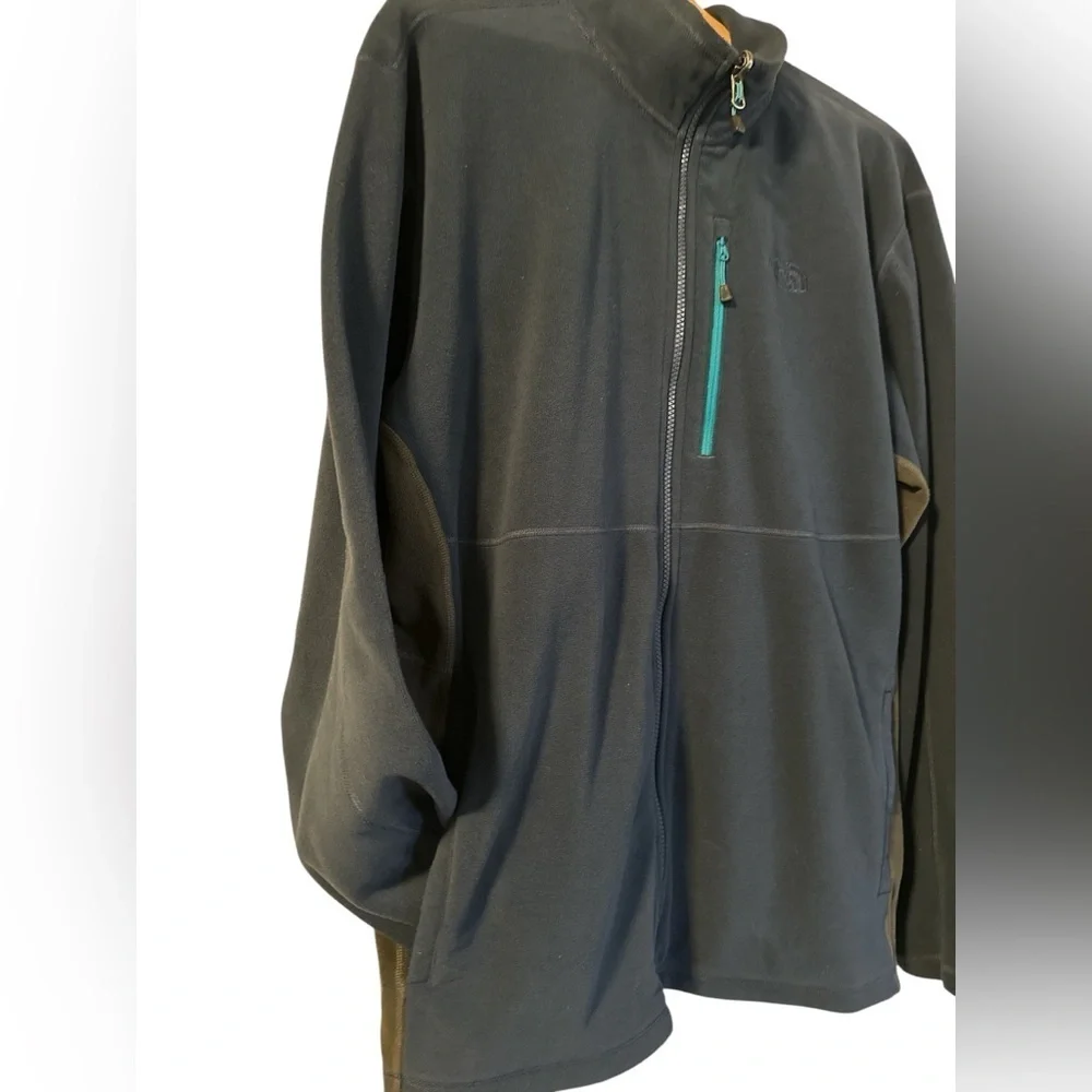 The North Face Navy Blue Fleece with Teal Accent Pocket and Dark Gray Side Panel